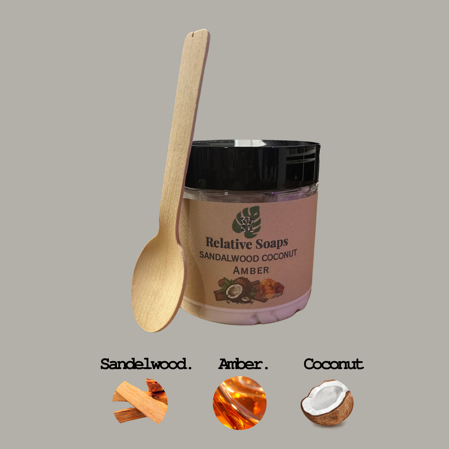 Jar of Relative Soaps Sandalwood Coconut Amber soap with a wooden spoon on a gray background